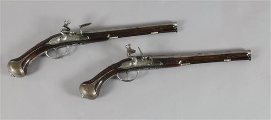 A pair of 20 bore Flemish flintlock holster pistols by C. Chaplot A. Adelshein, late 17th century, 12.75in. barrels, overall 20in.